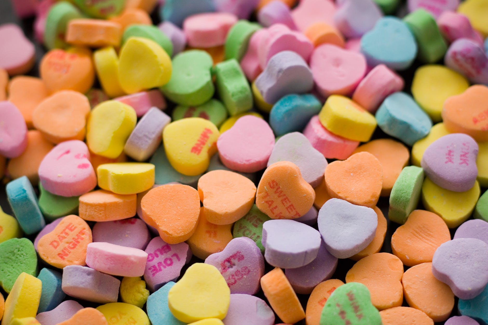 bunch of heart shaped assorted color tablets