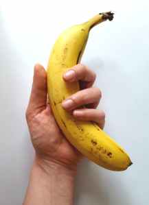 yellow banana on hand